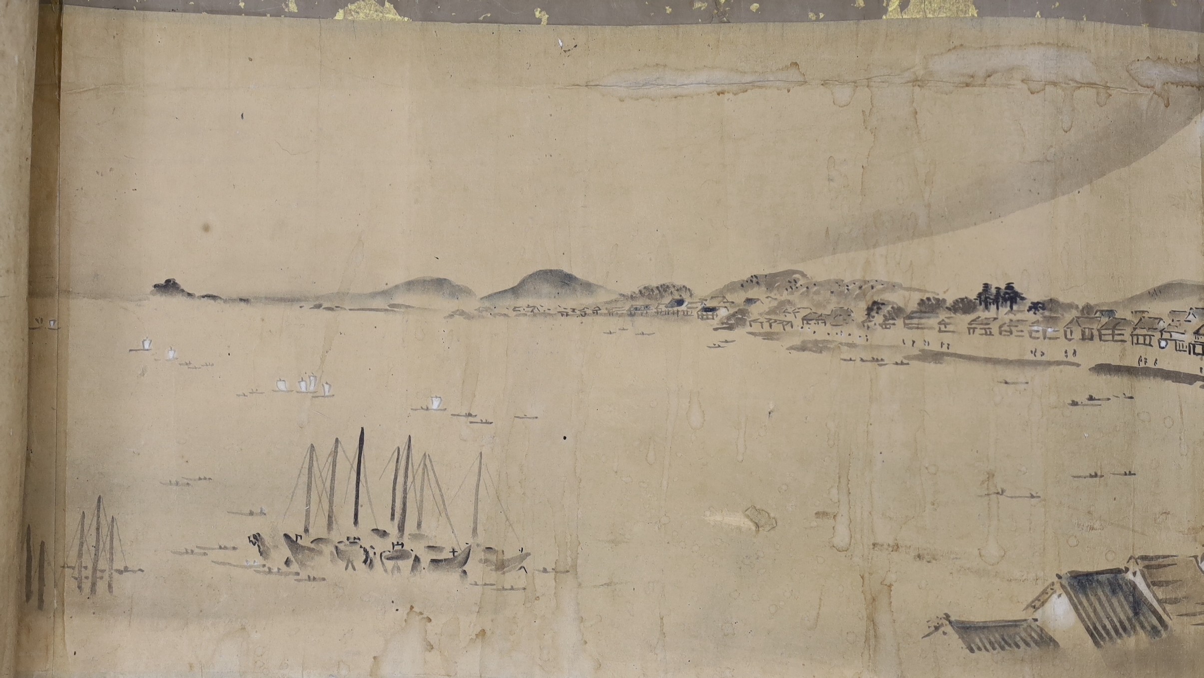 A Japanese landscape painting on paper hand scroll, Edo period, titled views, now in two parts, incomplete, image 27cm high x approximately 470cm wide